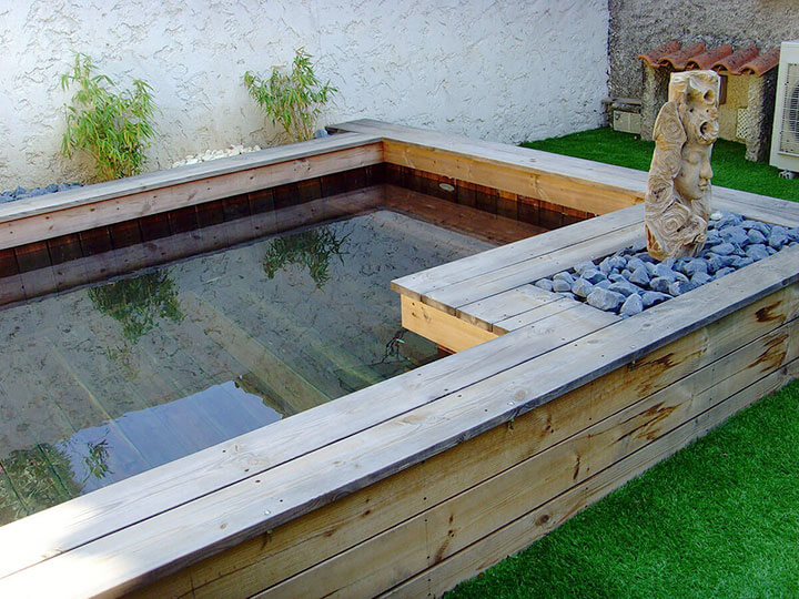 bassin sur terrasse avec jacuzzi et terrasse en bois
